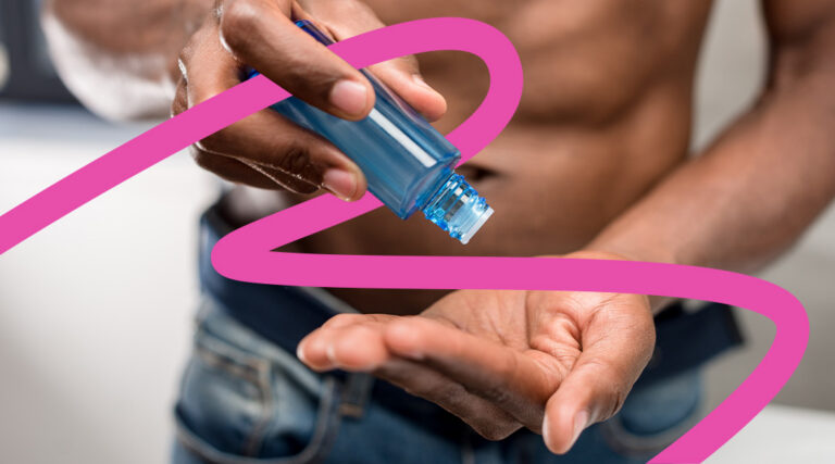 Person pours blue liquid from a bottle into their cupped palm, preparing to apply it to the hand.